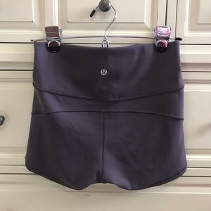 Lululemon purple tight in movement running shorts